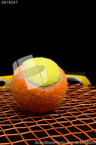 Image of Tennis ball for kids with tennis racket