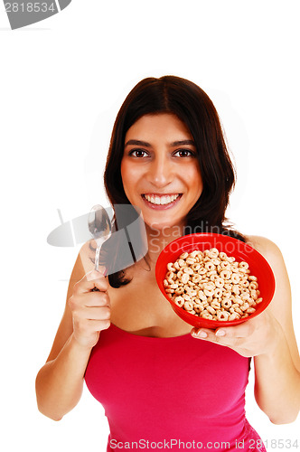 Image of Woman eating serial.