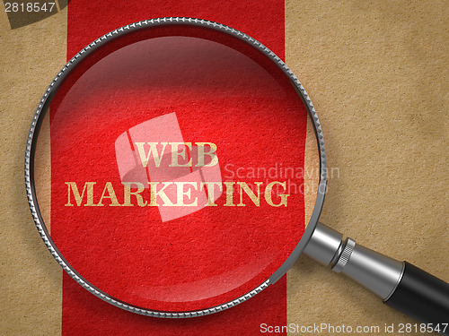 Image of Web Marketing Concept Through Magnifying Glass.