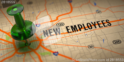 Image of New Employees - Green Pushpin on a Map Background.