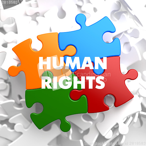 Image of Human Rights on Multicolor Puzzle.