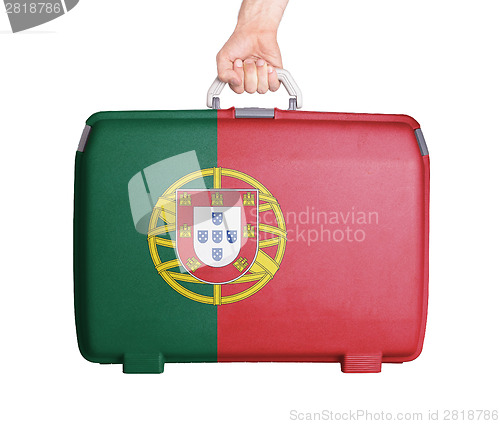 Image of Used plastic suitcase with stains and scratches