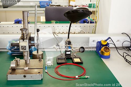 Image of electronics equipment assembly workplace