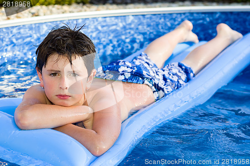 Image of Boy in swimming pool