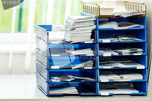 Image of file folders on the shelves at office