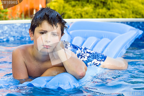 Image of Boy in swimming pool