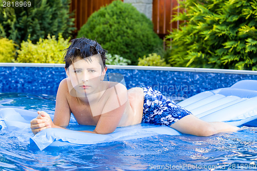 Image of Boy in swimming pool