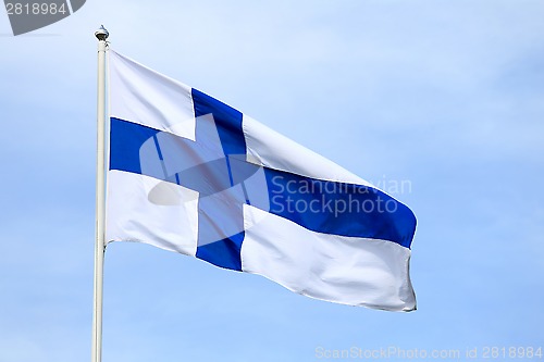 Image of Flag of Finland against Pale Blue Sky