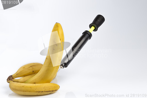 Image of Bananas and bicycle pump