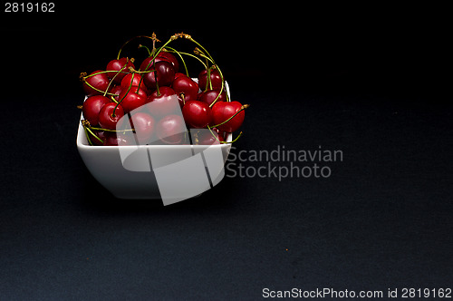 Image of  Bowl of Cherries on dark background