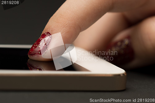 Image of Girl hand with smartphone