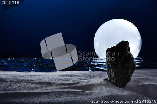 Image of moonset on the ocean