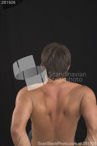 Image of close up of a young man back