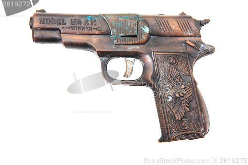 Image of old metal gun toy 