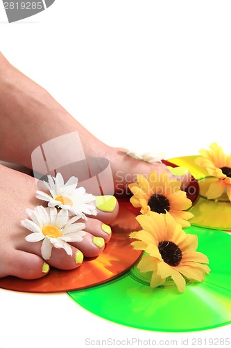 Image of womens legs with nice nails (pedicure)