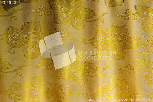 Image of The silk fabric which has been beautifully draped in the form of