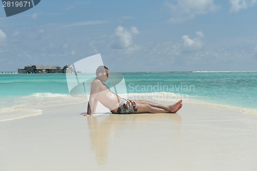 Image of beautiful young woman  on beach have fun and relax