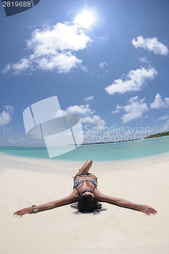 Image of beautiful young woman  on beach have fun and relax