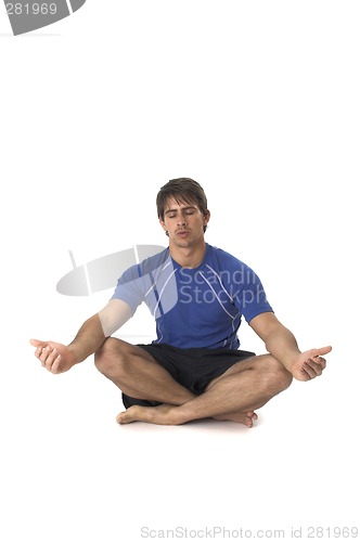 Image of young man doing yoga