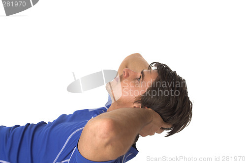 Image of young man doing push ups