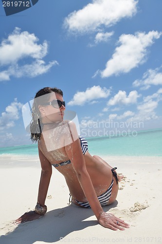 Image of beautiful young woman  on beach have fun and relax