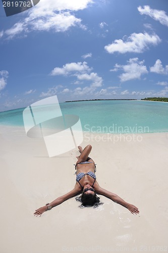 Image of happy young couple have fun on beach