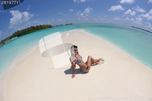 Image of beautiful young woman  on beach have fun and relax