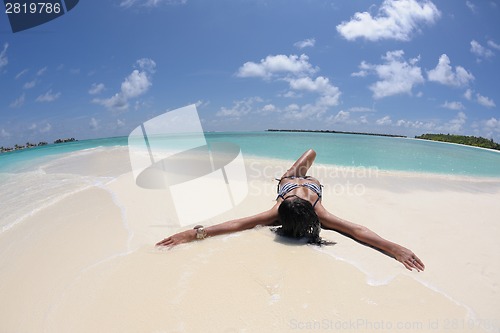 Image of beautiful young woman  on beach have fun and relax