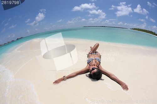 Image of beautiful young woman  on beach have fun and relax