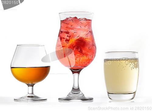 Image of three glasses of various drinks