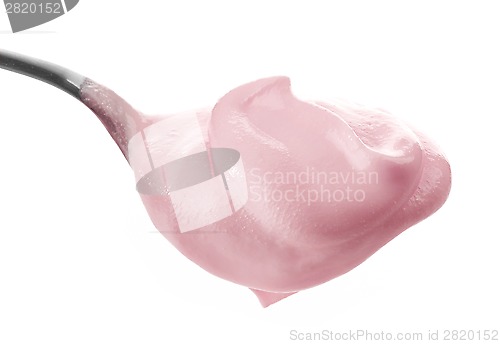 Image of Spoon with pink cream