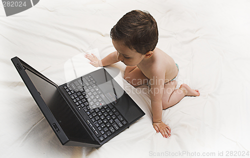 Image of baby and laptop