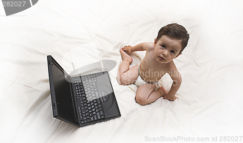 Image of baby and laptop