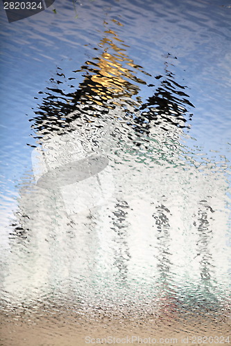 Image of Church of gold reflection ripples