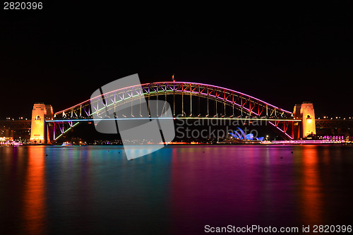 Image of Sydney Harbour Bridge in colour during Vivid Sydney festival