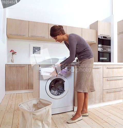 Image of girl in the laundry room a