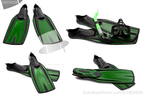 Image of Set of green swim fins, mask and snorkel for diving