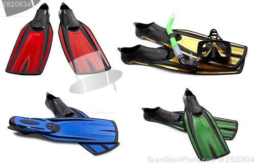 Image of Set of multicolored swim fins, mask and snorkel for diving