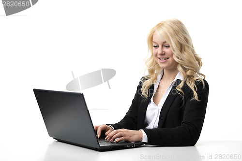 Image of woman working on laptop