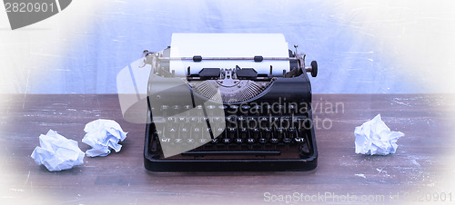 Image of Vintage typewriter and old books