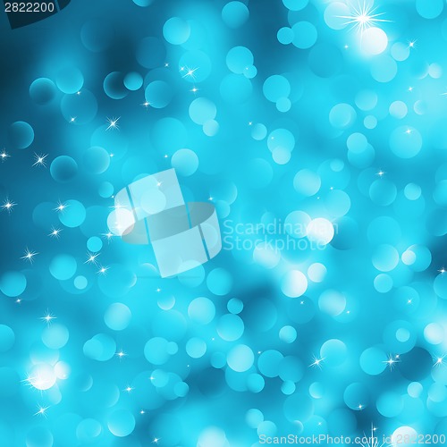 Image of Bright glitters on a soft blue background, EPS 8