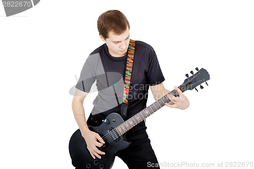 Image of Man on a white background. Performer with an electric guitar