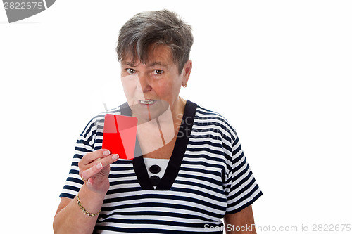 Image of Senior woman showing red card