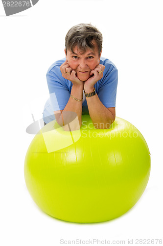 Image of Senior woman with fitness ball