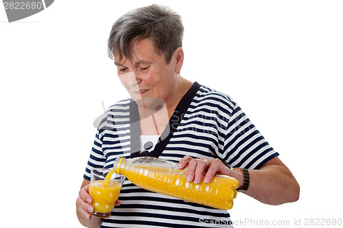 Image of Senior woman with orange juice