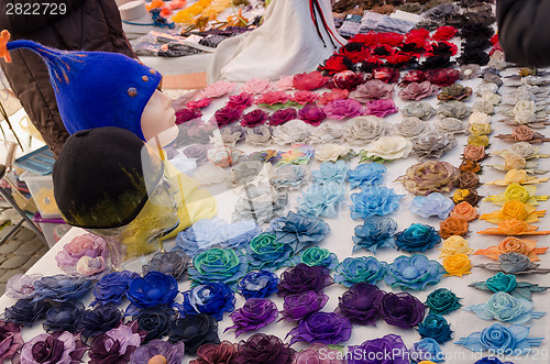 Image of feminine ornament of openwork material in market  