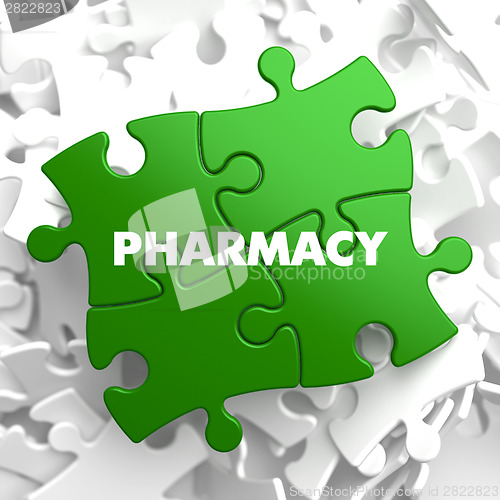 Image of Pharmacy - Concept on Green Puzzle.