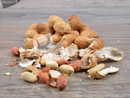 Image of Peanuts on wood