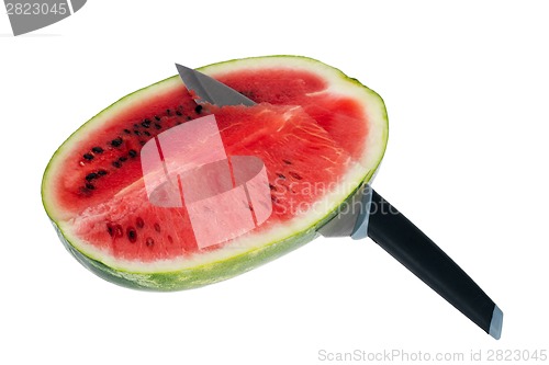 Image of Fresh watermelon with kitchen knife isolated over white background