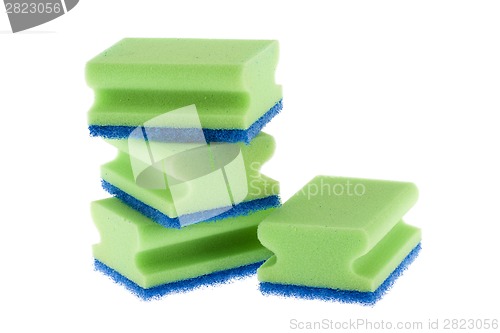 Image of Stack of cleaning sponges on a white background